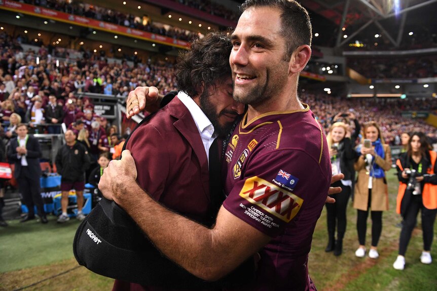 Queensland's Cameron Smith embraces an emotional Johnathan Thurston after Origin III, 2017