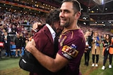 The Maroons' Cameron Smith reacts with Johnathan Thurston after State of Origin III, 2017.