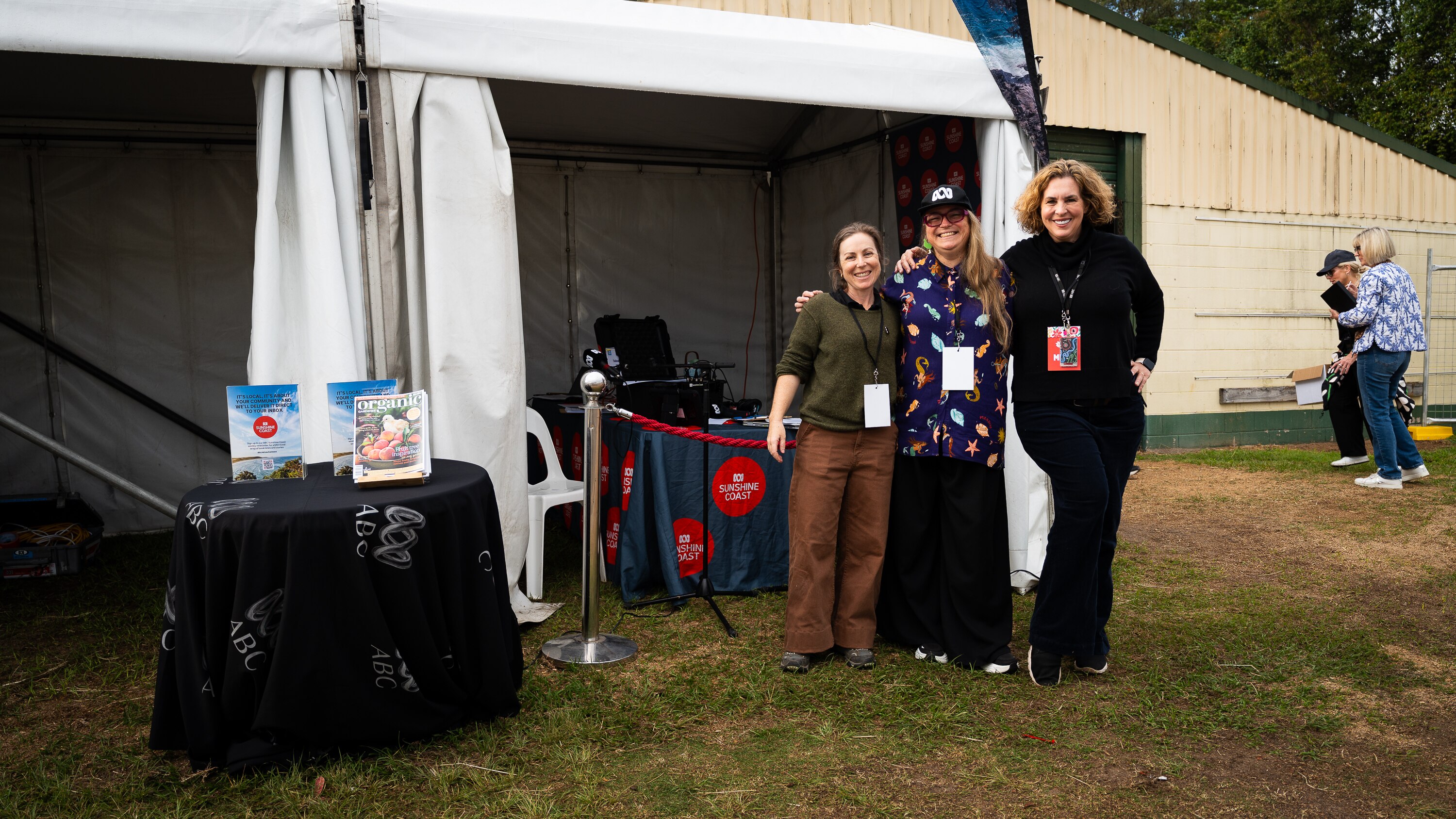 Photo of three radio presenters posing at an OB