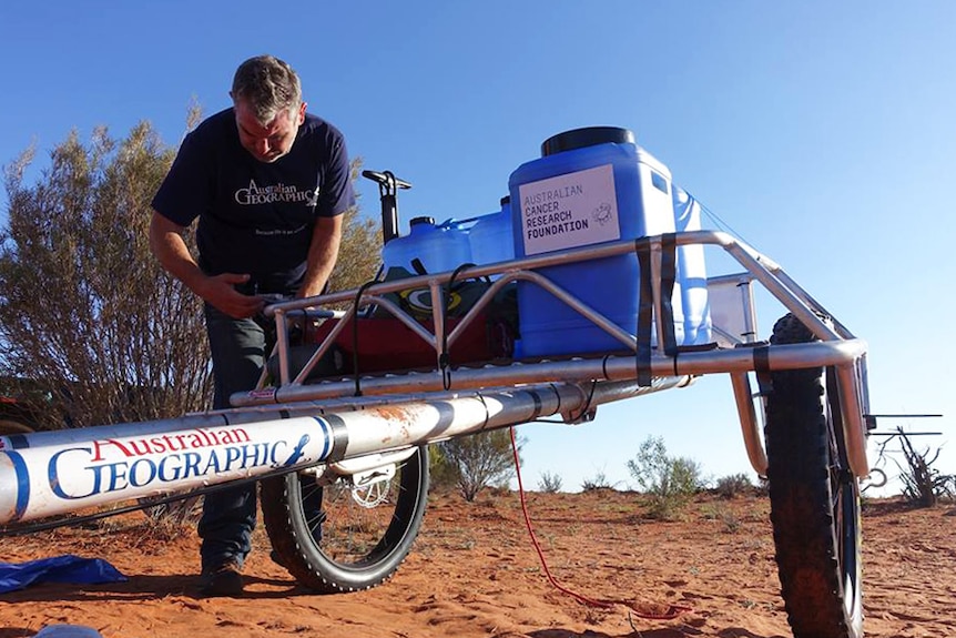 A man with a large cart.