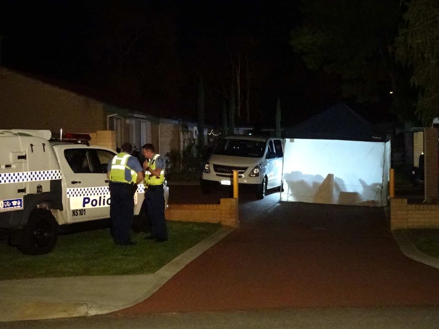 Police out the front of a house where a woman was killed on Whitehaven Crescent.