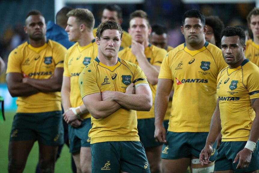 Michael Hooper of Australia (C) with team-mates after the loss to Scotland at the SFS in June 2017.