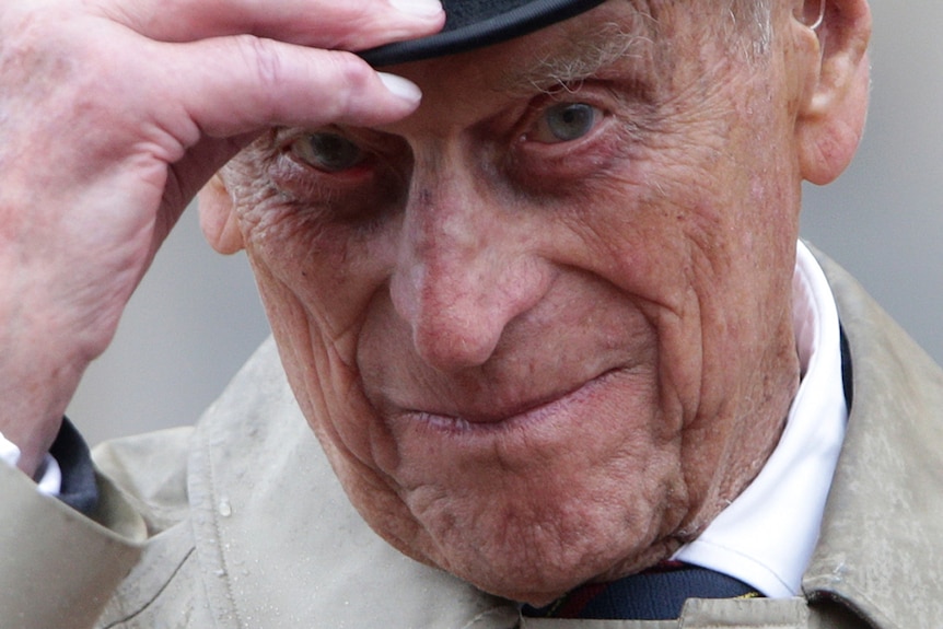 Prince Philip tipping his hat