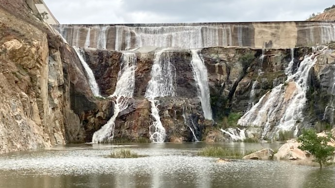 Water overflows from dam