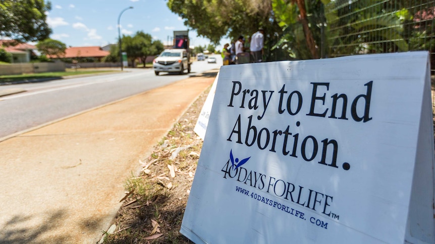 Prayer vigil being held outside abortion clinic