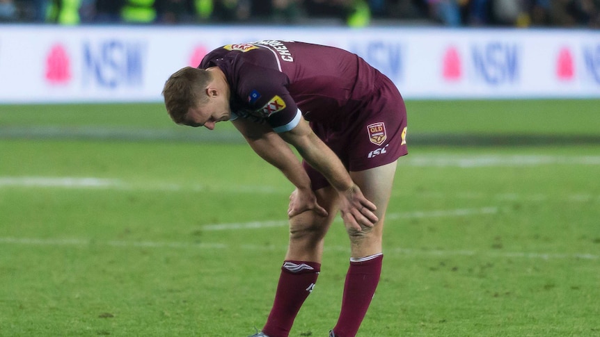 Daly Cherry-Evans bends over with his hands on his knees after State of Origin III in 2019.