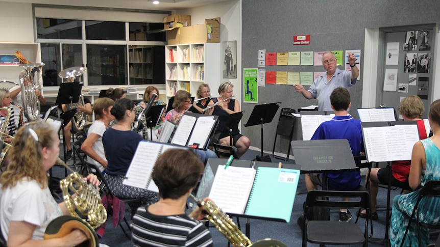 The Gold Coast City Wind Orchestra practices in a Southport primary school