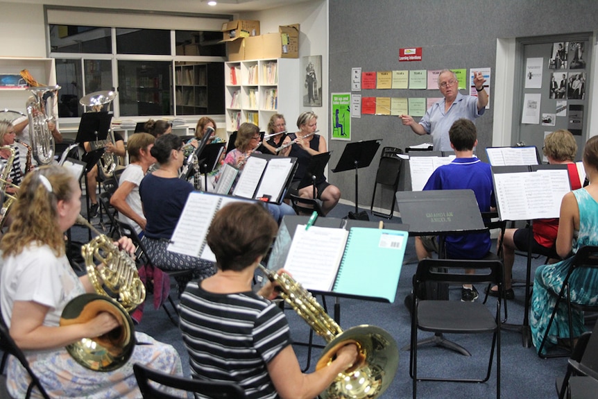 The Gold Coast City Wind Orchestra practices in a Southport primary school