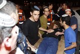 A casualty rushed to hospital after the Jerusalem shooting