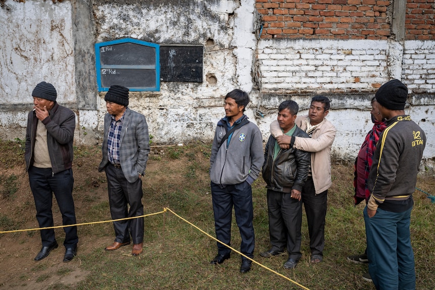 Spectators gather to watch a traditional archery competition in northern India