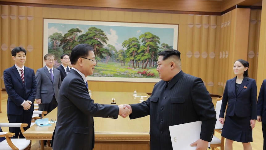 Kim Jong-un shakes hands with South Korean National Security Director Chung Eui-yong