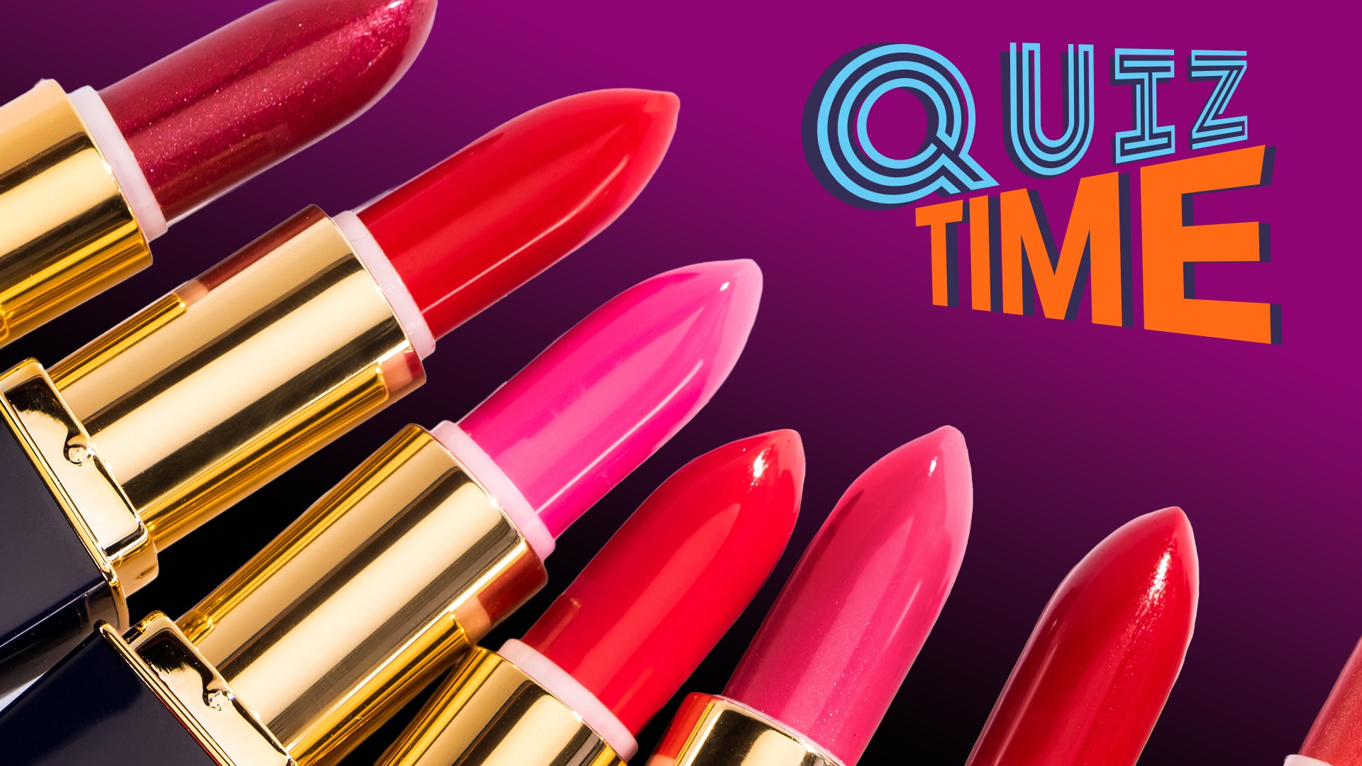 A row of different coloured lipsticks.