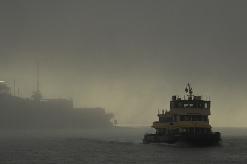 A ferry in fog