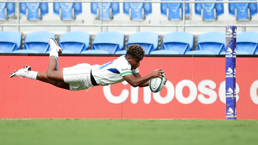 Merewalesi Rokouono glides through the air to score a try.