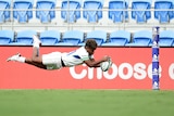 Merewalesi Rokouono glides through the air to score a try.