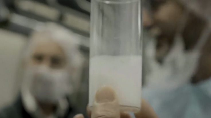 A beaker of milk in a lab