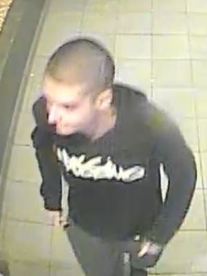 A CCTV image shows a teenager with a shaved head and a hooded jumper.