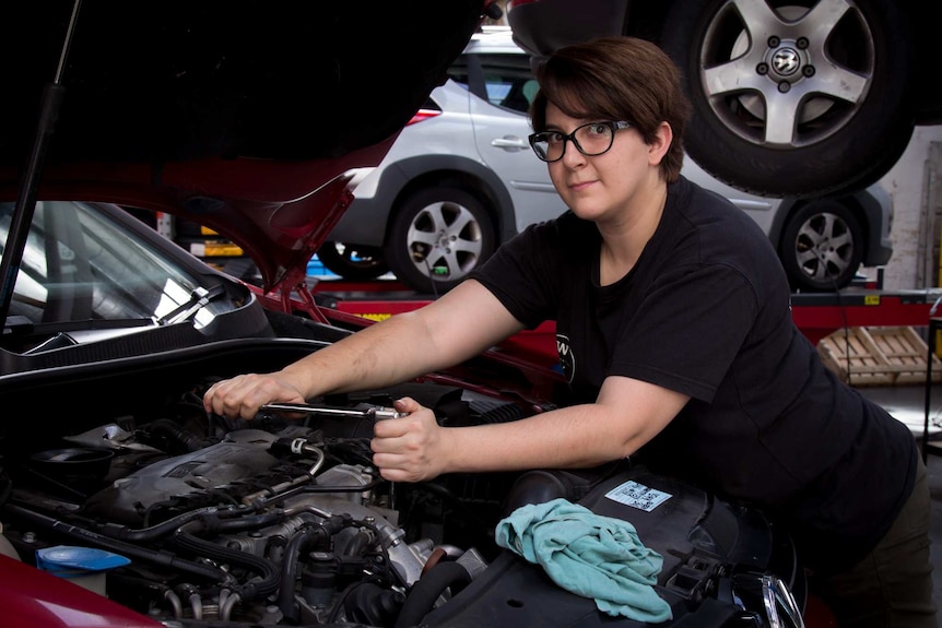 Terri Bournazos working on a car