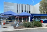 An exterior shot of the COVID-19 testing clinic at Fiona Stanley Hospital, with nobody in sight.