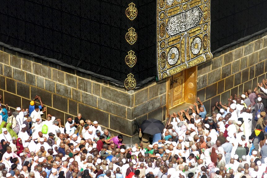 Muslims gathered around the Ka'aba in Mecca