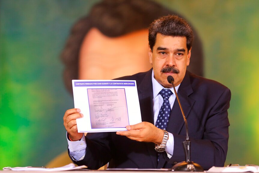 President Nicholas Maduro pictured accusing his opposition leader of being behind a military raid to oust him