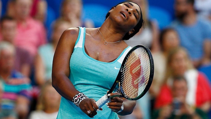 US player Serena Williams reacts to a point lost to Canada's Eugenie Bouchard at the Hopman Cup.
