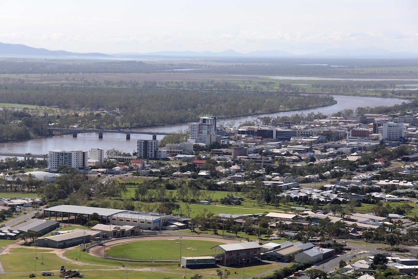 Wide photo of the city of Rockhampton and Fitzroy River in central Queensland.