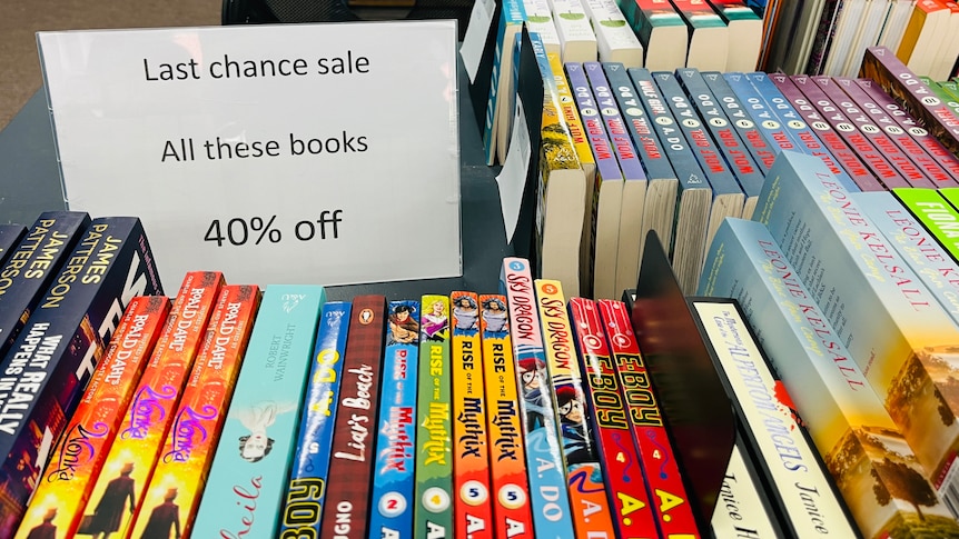 A table with books that are marked as 40% off.