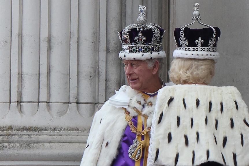 Charles wearing the Imperial State Crown post-coronation ceremony with Camilla wearing Queen Mary's Crown.