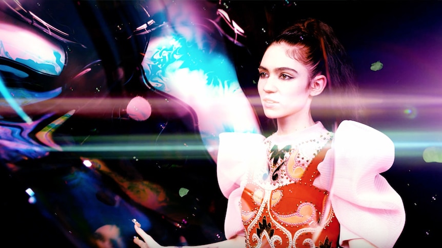 Grimes in the music video for 'Venus Fly'