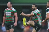 Greg Inglis attempts a late field goal against the Dragons