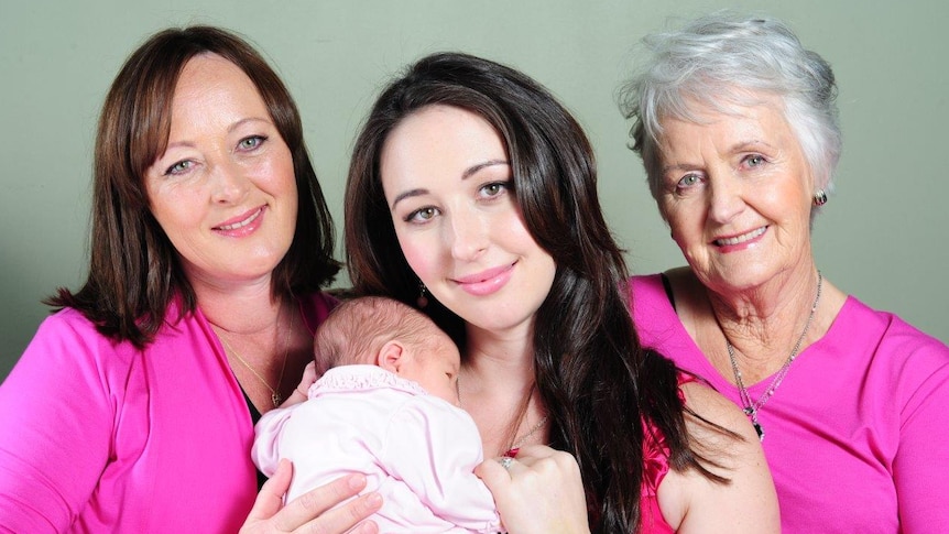 Krystal with her mother, grandmother and child