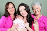 Krystal with her mother, grandmother and child