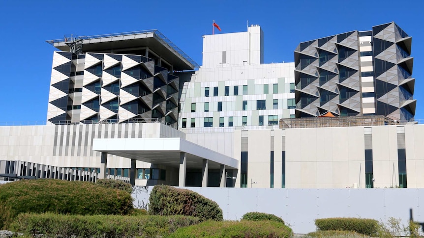 A wide shot of the exterior of Fiona Stanley Hospital exterior.