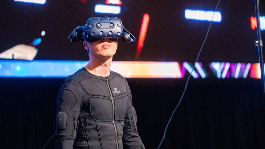 virtual reality Teslasuit can simulate everything from a to a hug ABC News