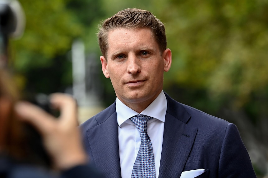 Andrew Hastie arrives at court