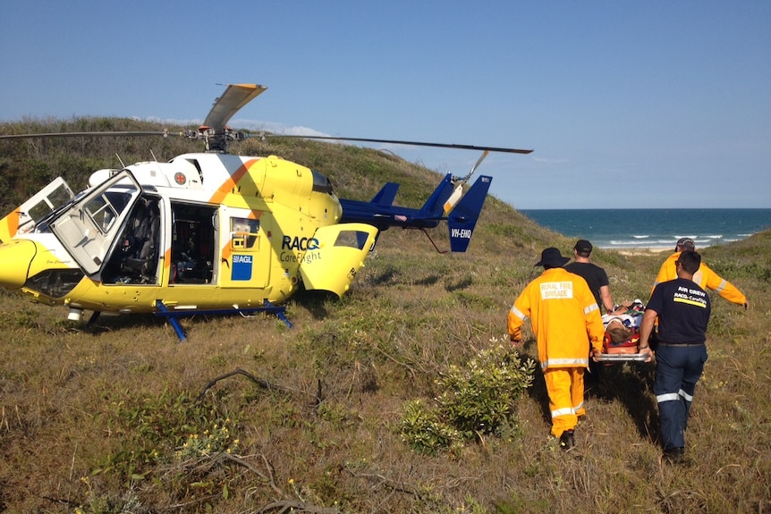 Tourists airlifted after four wheel drive rolls on Fraser Island