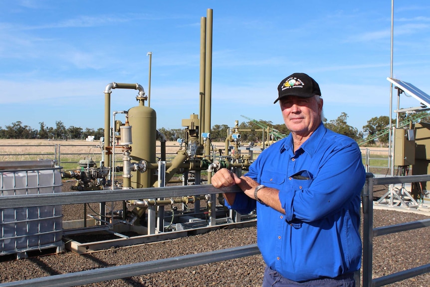 Farmer Peter Gett standing near a gas well on his farm near Narrabri in north west New South Wales.