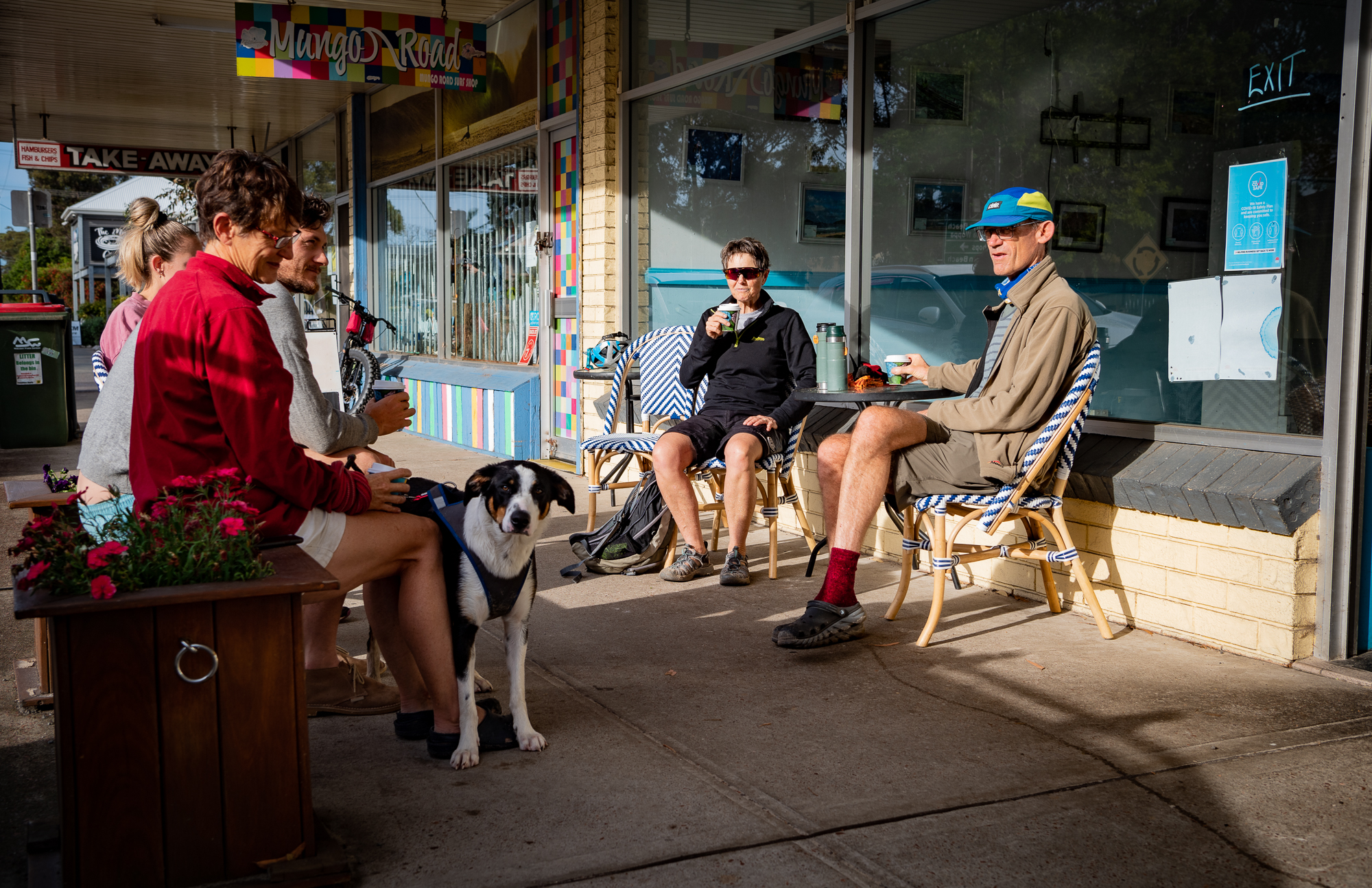 Locals having a coffee in Hawks Nest town centre.