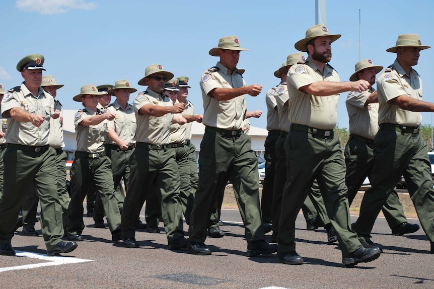 Prison guards marching into the new prison at Holtze