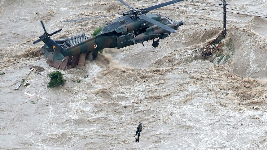 Helicopter rescues Japanese resident from floods