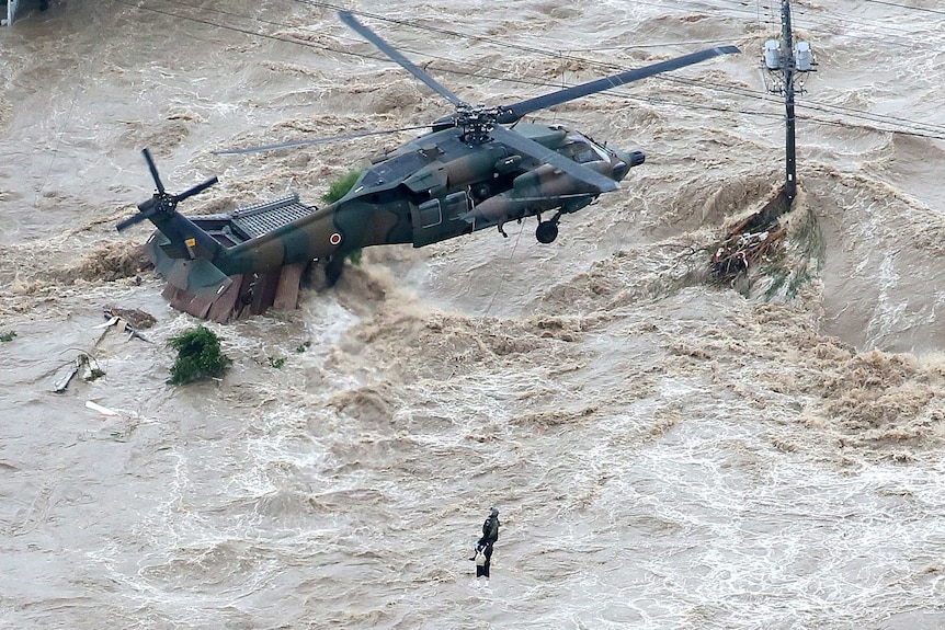 Helicopter rescues Japanese resident from floods