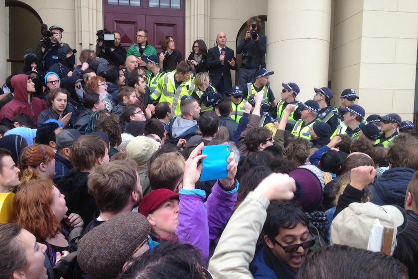 Police stand between opposing multiculturalism rallies in Richmond.