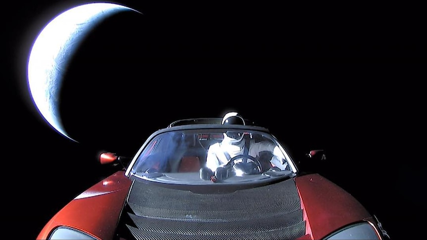 Elon Musk's Tesla Roadster enroute to Mars orbit and then the Asteroid Belt.