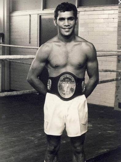 Hector Thompson standing in Gym.