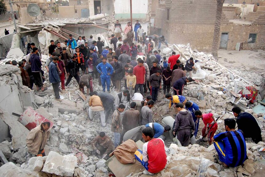 Iraqis search for survivors amid the rubble of a bombed house in the restive city of Ramadi, western Baghdad.