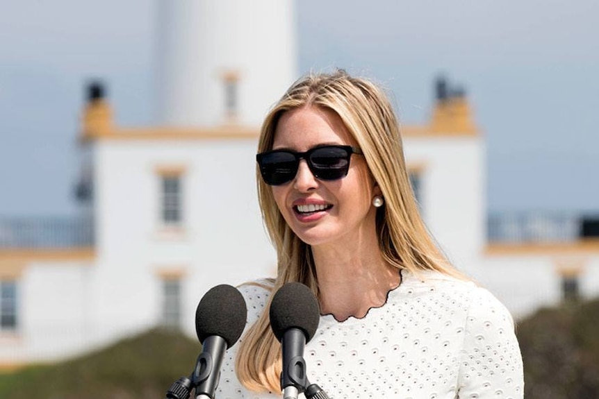 Ivanka Trump speaking with microphones in front of her