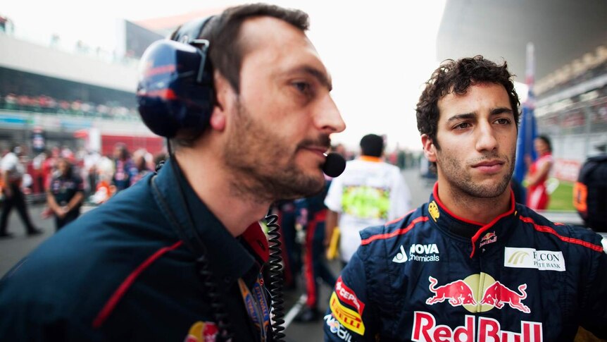 Australia's Daniel Ricciardo (R) waiting to drive at the Indian Formula One grand prix
