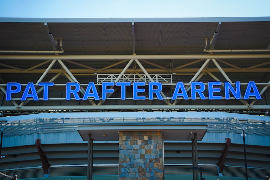 Blue letters spell out Pat Rafter Arena at the tennis facility's entrance