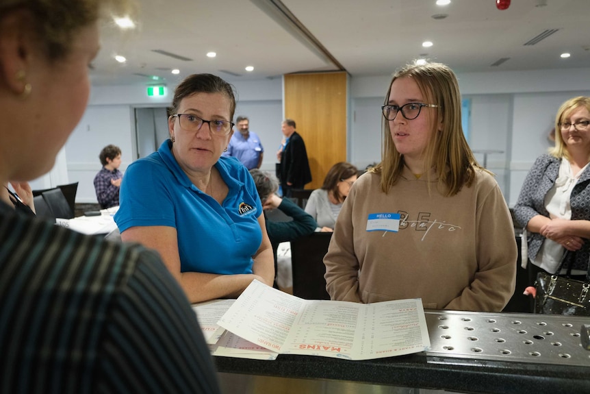 Rose Fisher ordering dinner at Sydney's first dinner for autistic adults.